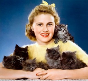 1941: kittens with Joan Caulfield